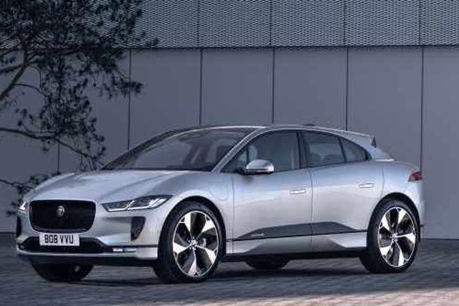 Jaguar I-Pace electric car exterior front parked outside building